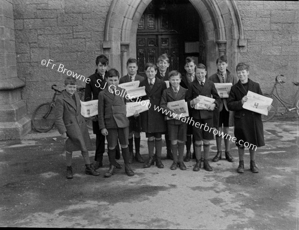 BOYS WITH STANDARD NEWSPAPER